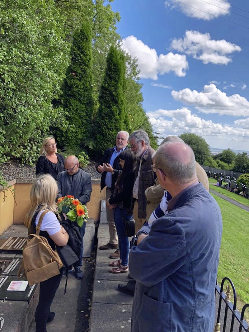 Gerry Adams, Dessie Mackin, Paul Maskey MP, Jim Gibney at a service in Hannahstown Cemetery for the late Billy Hampton where his remains were interred late last year. 