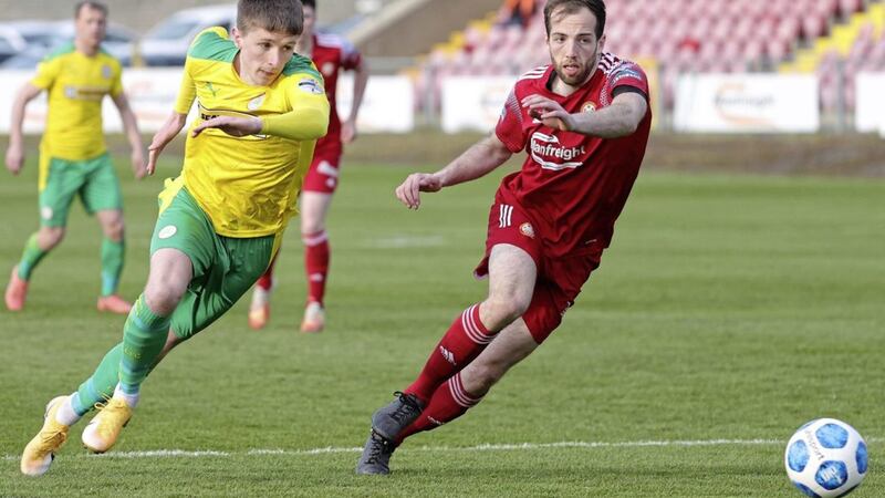 Cliftonville&#39;s Ryan Curran (left) takes on Portadown&#39;s Adam McCallum during the visitors&#39; 2-1 win at Shamrock Park in April last year. 