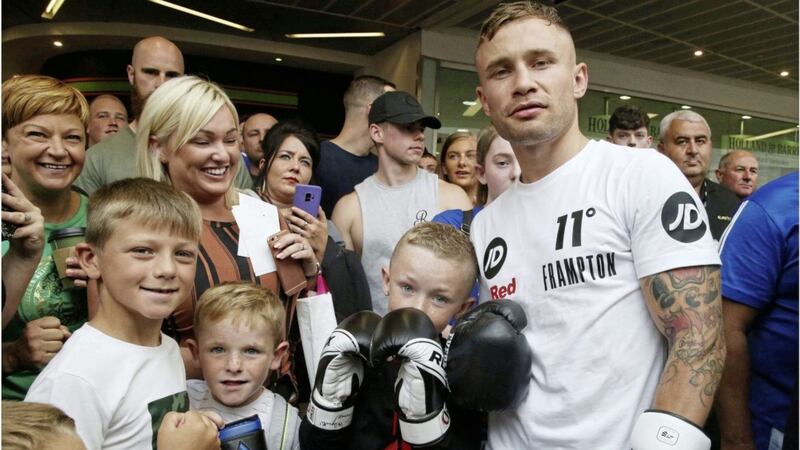 Man of the people. Carl Frampton meets his fans before his fight at Windsor Park. Picture by Hugh Russell. 