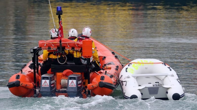 &nbsp;The RNLI&nbsp;tows a small boat into Dover, Kent, following a number of small boat incidents in the Channel on August 15 2020. Picture by Gareth Fuller/PA Wire