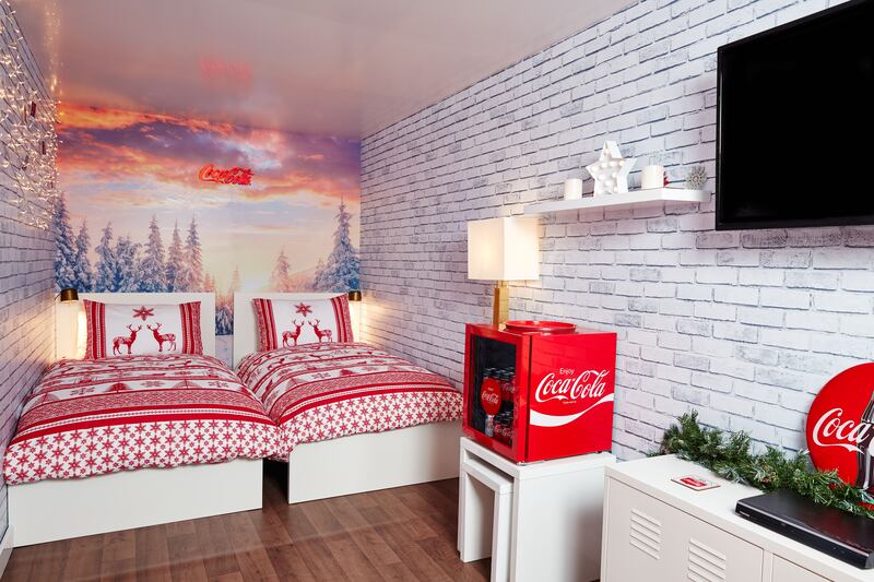 Twin beds inside the Coca-Cola Christmas truck