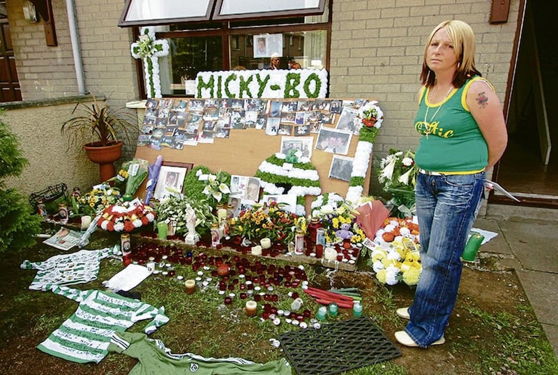 Michael McIlveen&#39;s mother Gina at a shrine to Michael in the garden of their Ballymena home in the days after his murder. Picture by Alan Lewis 