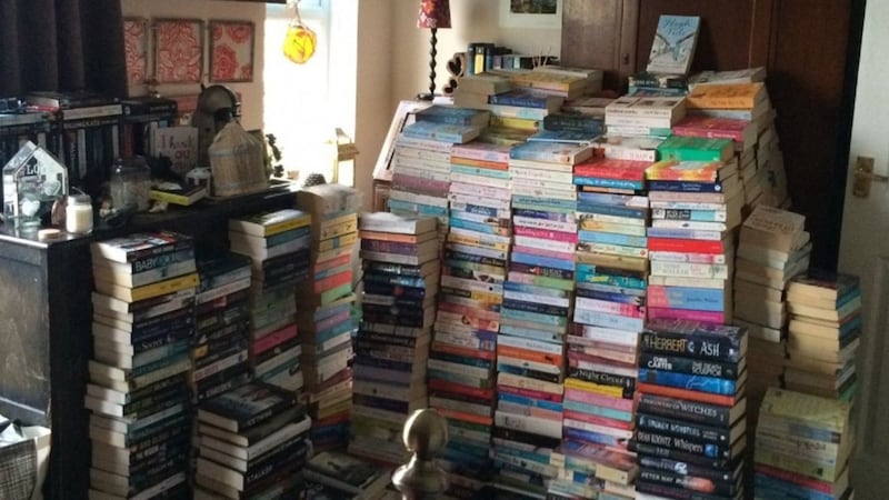 This woman has built a house of books in her bedroom to save them from floods