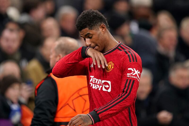 Marcus Rashford walks off the pitch after being shown a red card 