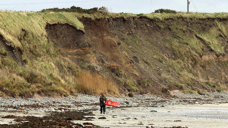Erosion at Ballyhornan beach in Co Down. Soon the road at the top of the cliff will be under threat. Picture by Philip Walsh