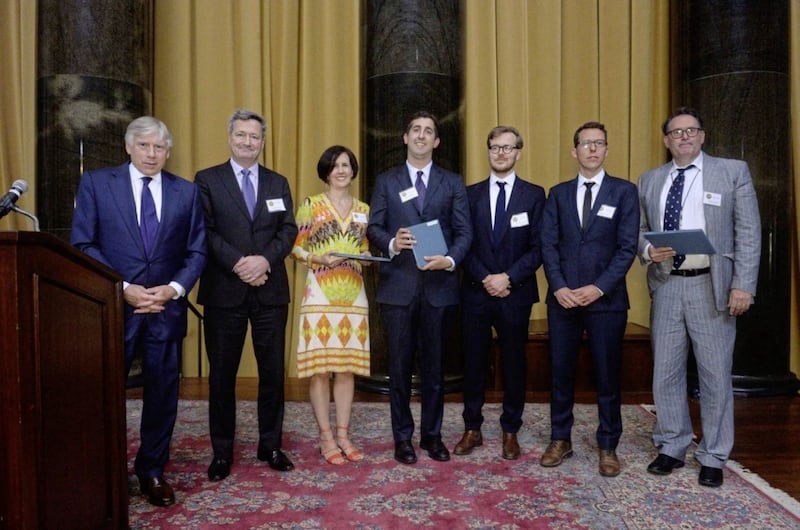 Gerard Ryle and Marina Walker of the ICIJ, Nicholas Nehamas of the Miami Herald, Frederik Obermaier and Bastian Obermayer of Suddeutsche Zeitung and Kevin Hall of McClatchy accept the 2017 Pulitzer Prize for Explanatory Reporting from Columbia University President Lee C Bollinger. 