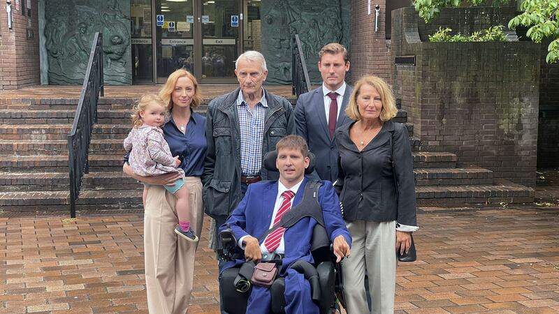 Tom Somerset-How with mother Helen Somerset-How, brother Ben Somerset-How, sister Kate Somerset-Holmes and father John Somerset-How outside Portsmouth Crown Court (Ben Mitchell/PA)