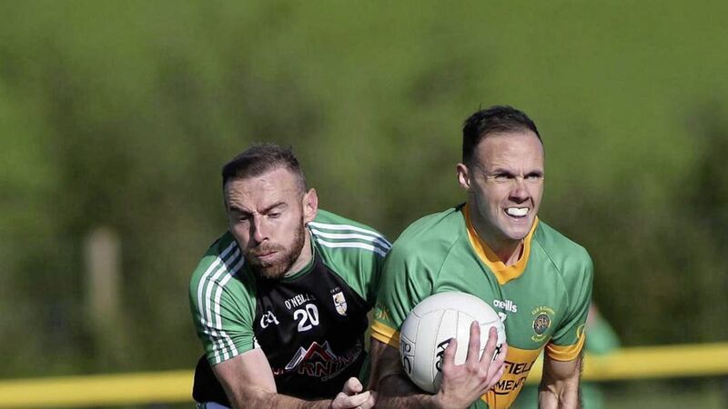 Cargin&#39;s Ciaran Close (left) tries to stop Creggan&#39;s Ricky Johnston in Sunday&#39;s final Picture: Hugh Russell 