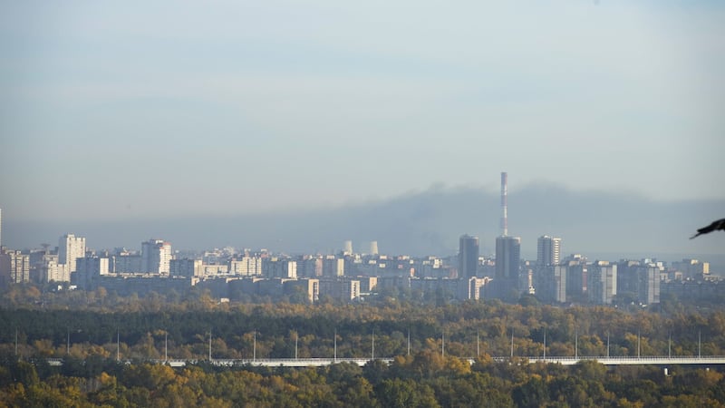 Smoke rises after Russian shelling in Kyiv, Ukraine, Tuesday, Oct.  18, 2022.  (AP Photo/Efrem Lukatsky)