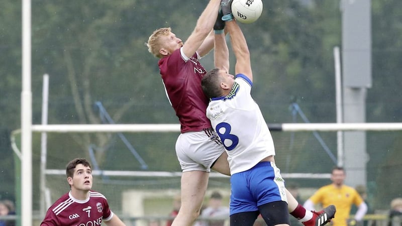 Slaughtneil Padraig McGuigan with Kevin McGuckin of Ballinderry during the Derry Senior Football Championship quarter final match at Glen Maghera on Sunday. Picture Margaret McLaughlin 22-9-2019 