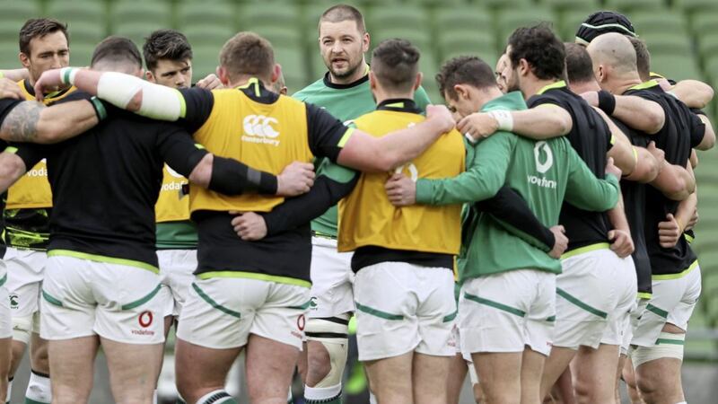 Ireland captain Iain Henderson (centre) speaks to the players before facing France in Dublin earlier this month. 