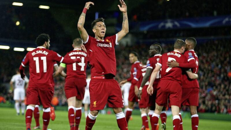 Liverpool&#39;s Roberto Firmino celebrates after scoring his side&#39;s fifth goal 