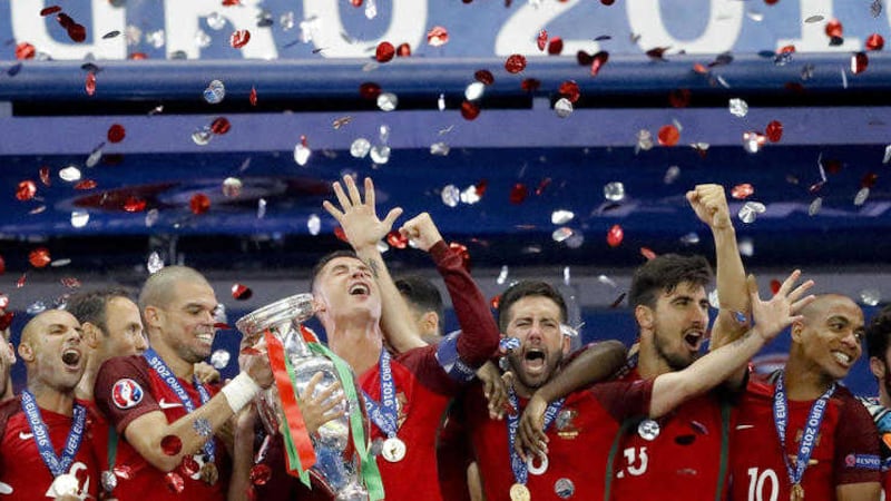Portugal celebrate their victory over France in last Sunday's Euro 2016 final at Stade de France<br />Picture by AP