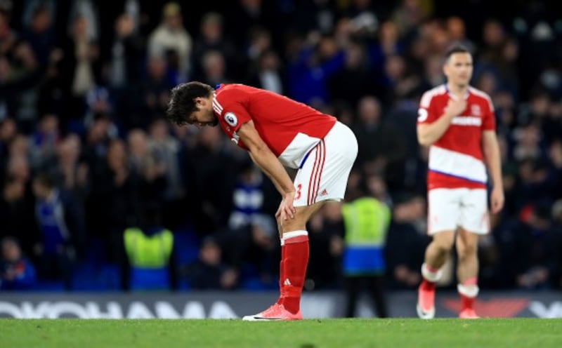 Middlesbrough players react after the final whistle against Chelsea