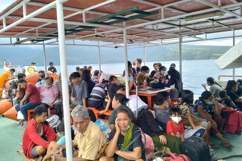 Residents of Tagulandang island wait to be evacuated by a National Search and Rescue Agency ship (Indonesian National Search and Rescue Agency/AP)