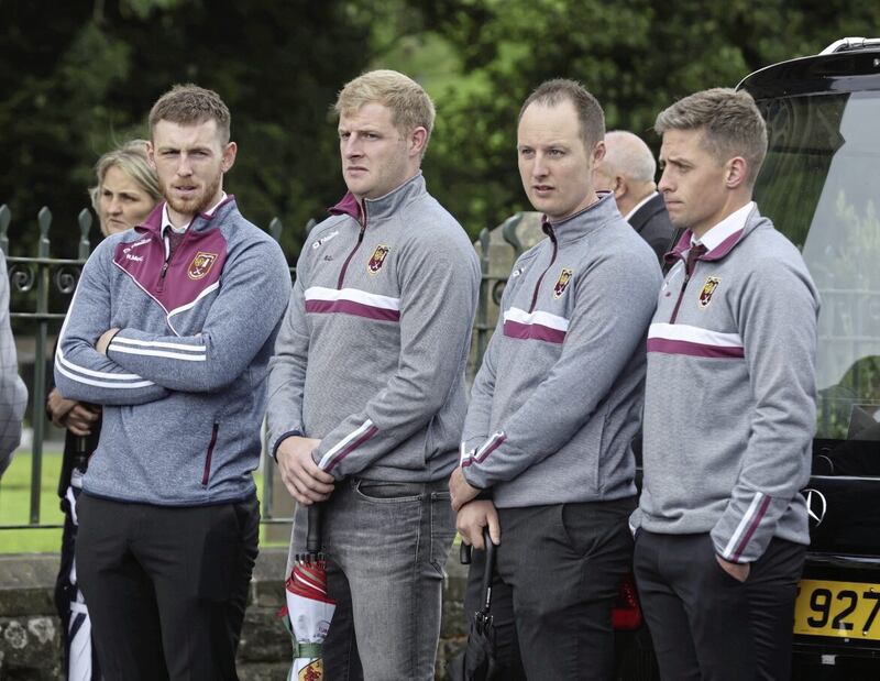 Club-mates of John McKillop at yesterday&#39;s final farewell in Cushendall Picture by Hugh Russell. 