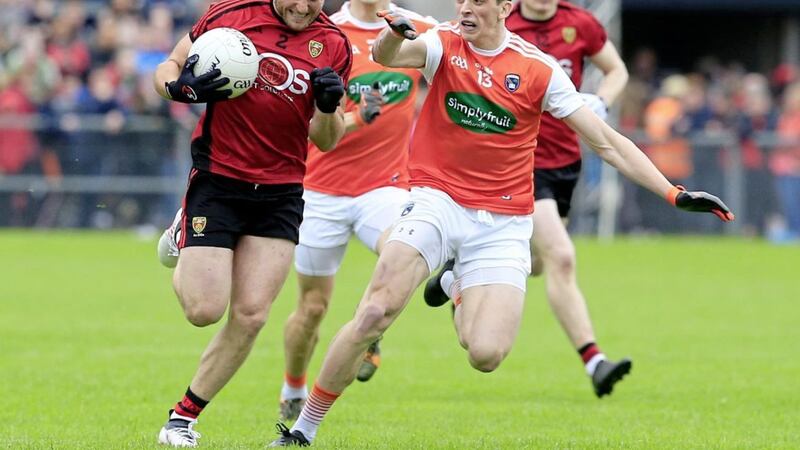 Down&#39;s Darren O&#39;Hagan and Armagh&#39;s Rory Grugan in action during the Ulster Senior Football Championship quarter-final at Pairc Esler. Picture by Philip Walsh. 
