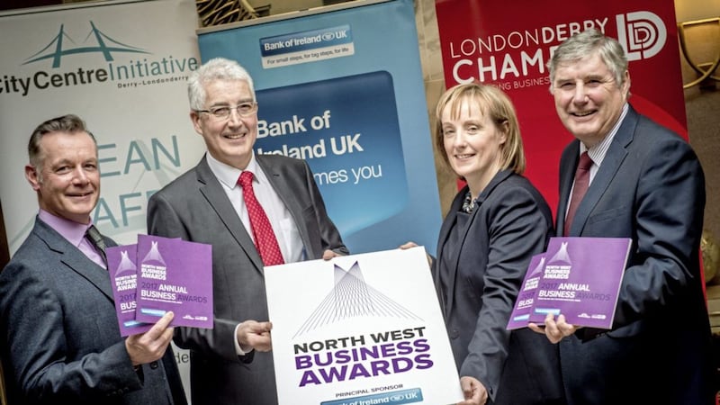 Launching the business awards are (from left) Hugh Hegarty, City Centre Initiative chairman; Eugene Kearney, commercial branch manager Bank of Ireland UK; Christine Graham, senior business manager Bank of Ireland UK; and George Fleming, Londonderry Chamber of Commerce president 