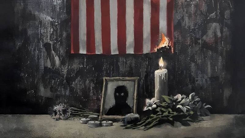 The anonymous graffiti read: ‘People of colour are being failed by the system’ alongside a painting of the American flag burning.
