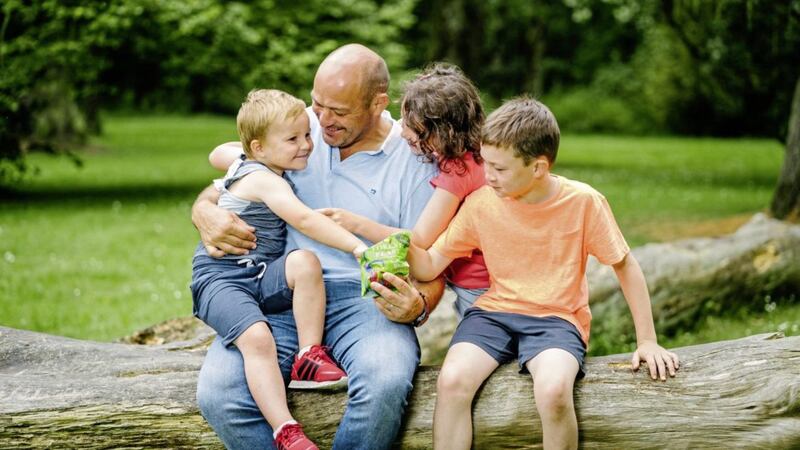 Forest Feast ambassador Rory Best and his children Richie (4) Penny (7) and Ben (10) enjoy a tasty snack from the new Super Fruit Shapes kids&#39; range 
