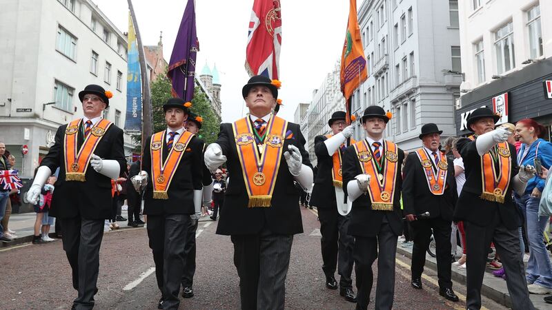 Orange men take part in a Twelfth of July parade in Belfast in 2022 (PA)
