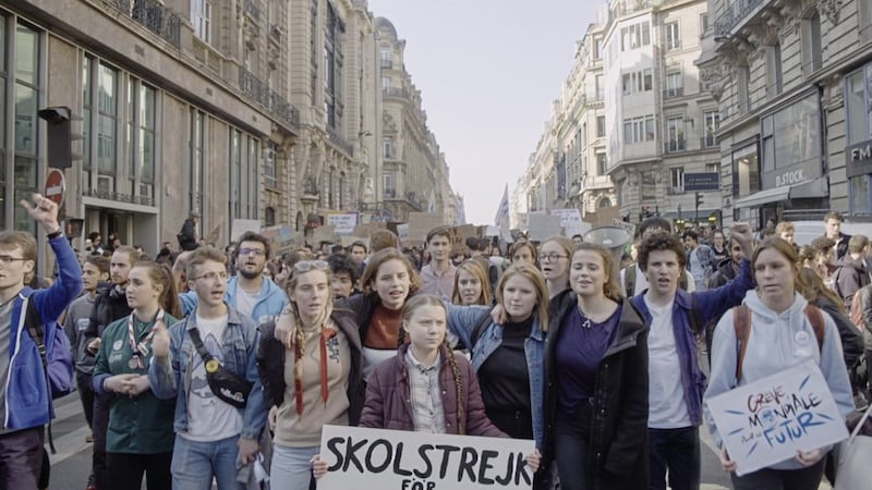 Greta Thunberg shown at the head of a student climate crisis protest in I Am Greta 