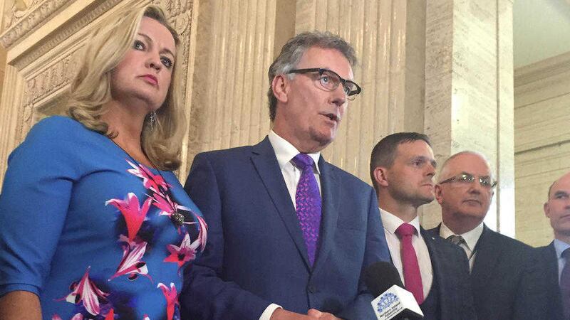 UUP leader Mike Nesbitt (centre) said his conditions for joining the executive had not been met. Picture by David Young/PA Wire              