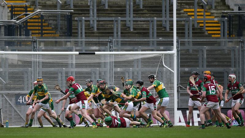 Eoghan Rua&rsquo;s Colm McGoldrick fires in a last-gasp shot as Glenmore&rsquo;s defenders scramble to make a block during yesterday&rsquo;s All-Ireland Club Junior Hurling Championship final at Croke Park 	<span class="Apple-tab-span" style="white-space: pre;">	</span>