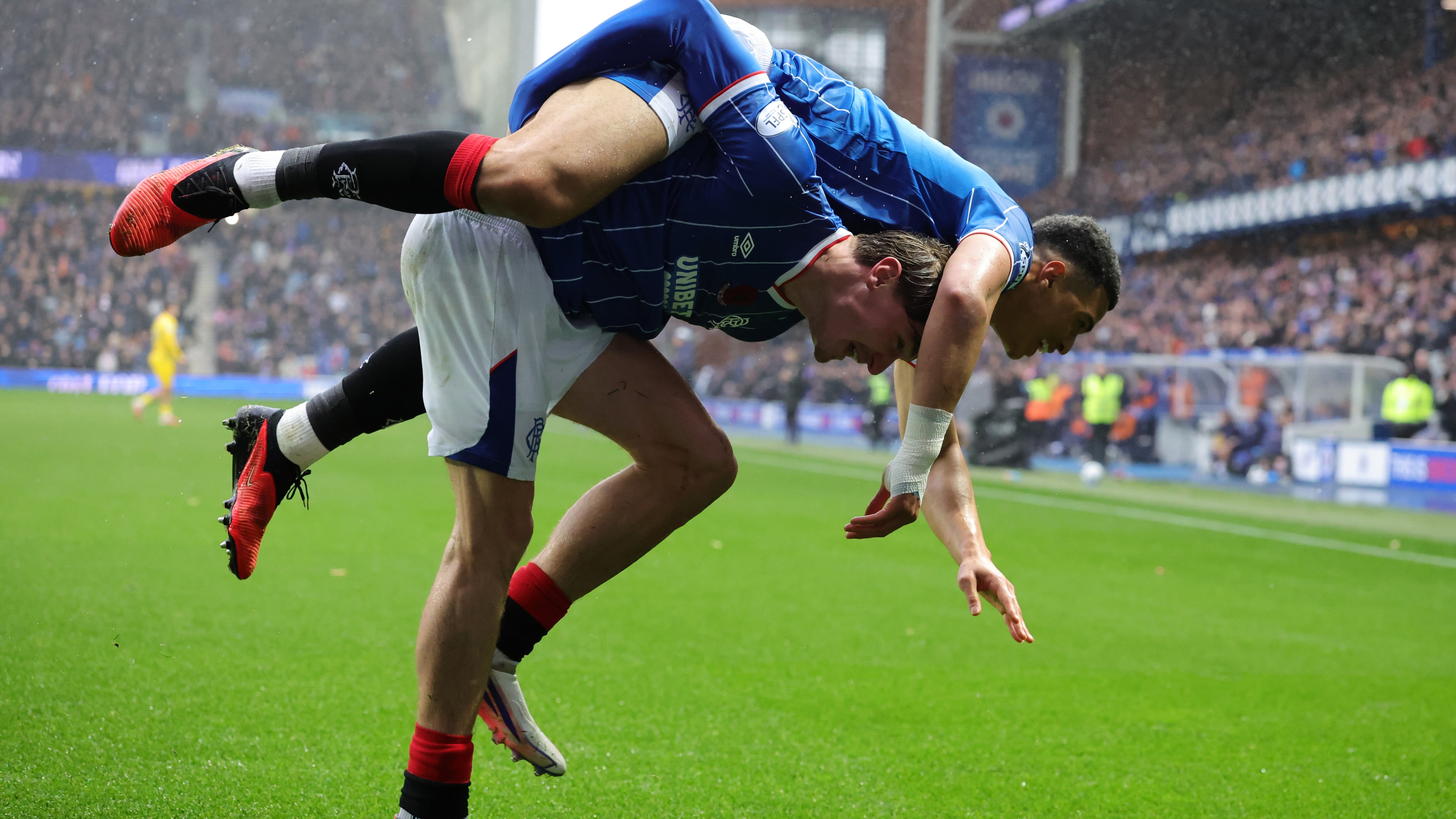 Rangers’ Kevin Kelsy, right, celebrates opening the scoring