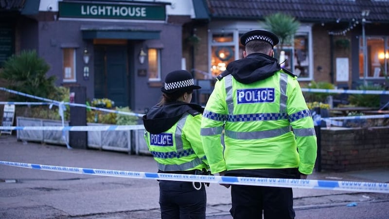 Police officers on duty at the Lighthouse Inn in Wallasey Village, Wirral (Peter Byrne/PA)