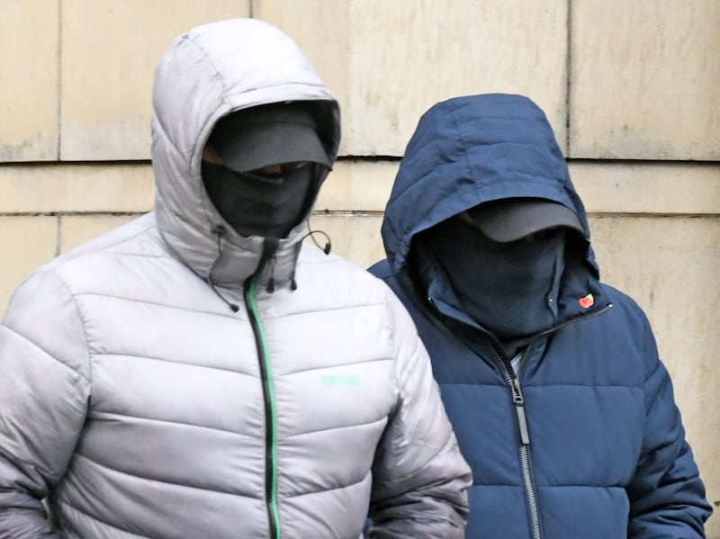 For the second day running masked men attended Belfast Crown Court. Picture, Alan Lewis - Photopress.
