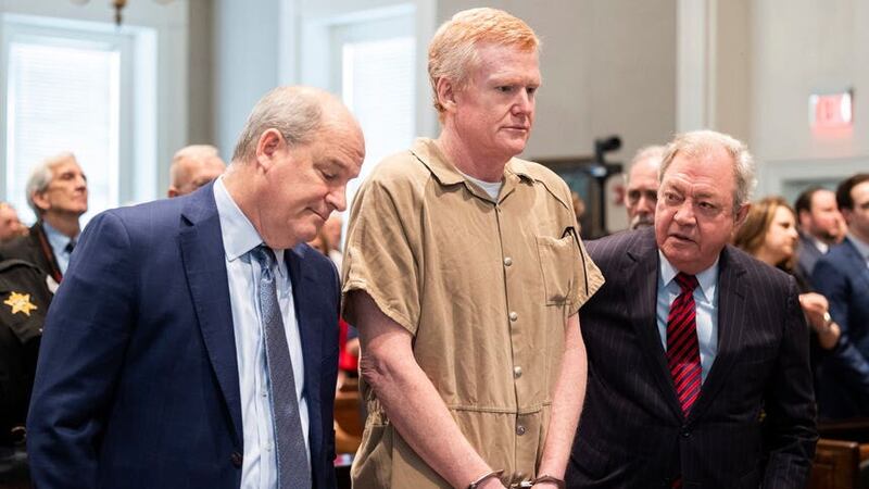 Alex Murdaugh speaks with his legal team before he was sentenced to two consecutive life sentences for the murder of his wife and son (Joshua Boucher/The State via AP/PA)