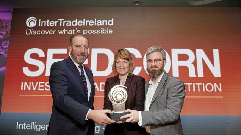 Ken Nelson (left), InterTradeIreland Chairman, presents the overall winner of the 2017 InterTradeIreland Seedcorn Competition, Belfast-based Phion Therapeutics, with their award.  Also pictured from Phion Therapeutics are Professor Helen McCarthy and Darrach Neeson.   Picture Conor McCabe Photography. 
