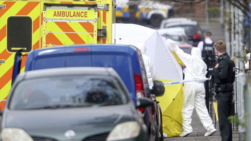 Forensic officers erect a tent at the scene in Etna Drive, Ardoyne where Robbie Lawlor (36) was murdered. Picture by Mal McCann 