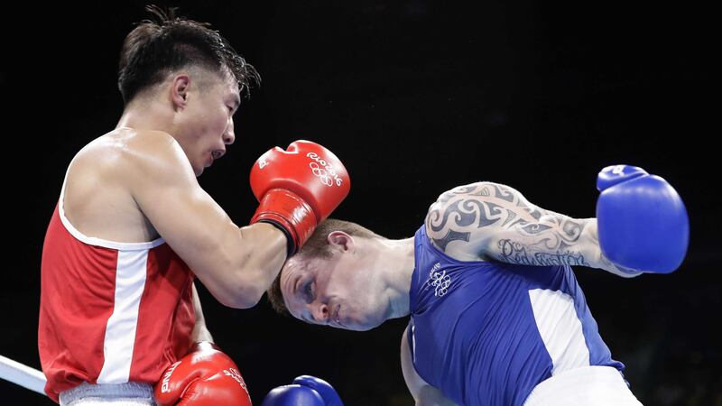Ireland's Steven Donnelly fights Mongolia's Tuvshinbat Byamba.&nbsp;Picture by PA
