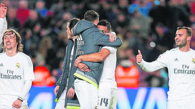 Real Madrid players celebrate after their victory over Barcelona at the Camp Nou on Saturday night<br />Picture by AP