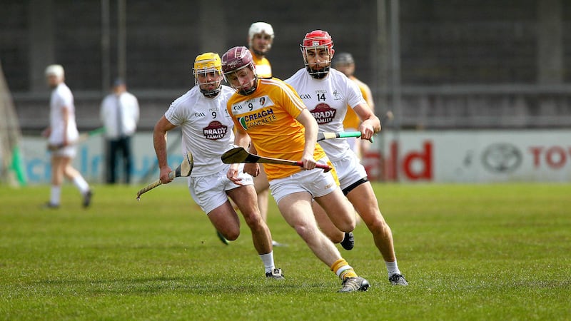 Antrim&rsquo;s Eoghan Campbell gets away from Kildare&rsquo;s Paul Divily and Paudie Ryan in a Christy Ring Cup round one match at Parnell Park.&nbsp;Picture&nbsp;by Seamus Loughran