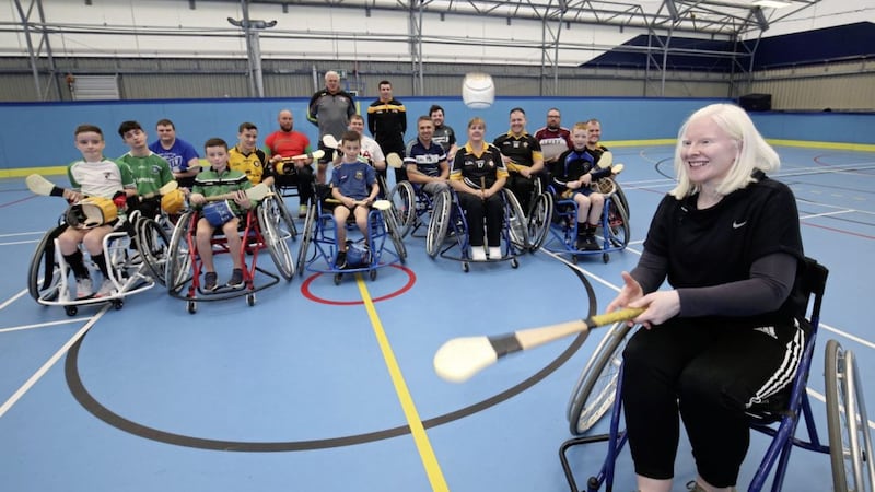 NI Winter Paralympic gold medallist Kelly Gallagher swapped her skiing sticks for a hurley, joining Ulster GAA's Wheelchair Hurling project as both chase success in the 25th Birthday National Lottery Awards. Kelly is nominated in the Sporting Legend category while the wheelchair hurlers are battling it out to be named Best Sports Project in the awards. Voting closes at midnight on August 21 and votes can be cast online at www.lotterygoodcauses.org.uk/awards or by tweeting #NLAKellyGallagher or #NLAWheelchairHurling<br /> Pic: Presseye