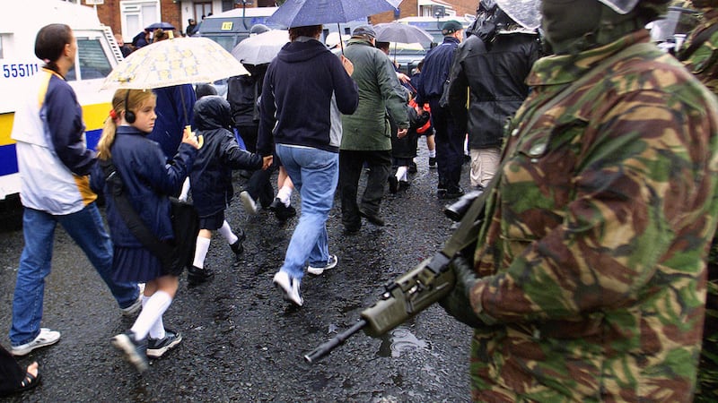 Security amid a loyalist protest against Catholic schoolgirls going to Holy Cross Primary School in north Belfast.