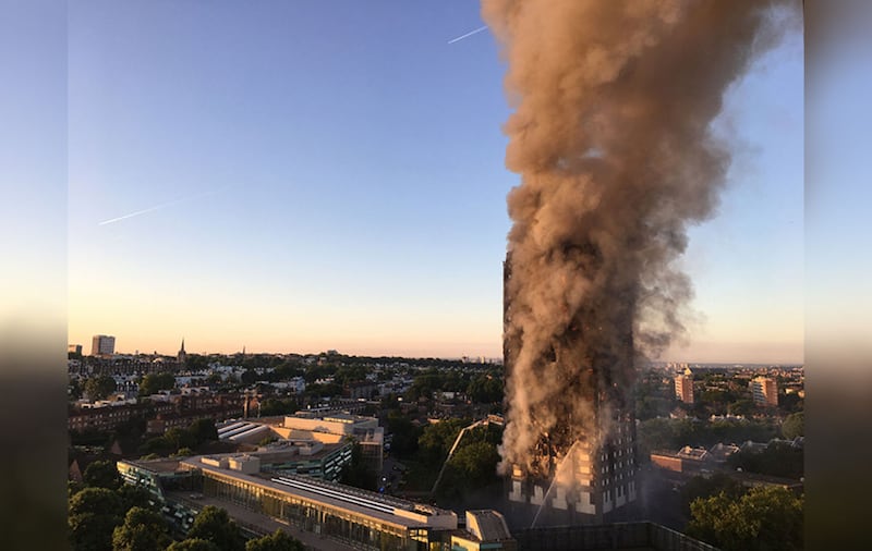 Smoke billowing from the tower block in the hours after the blaze.&nbsp;Picture by Natalie Oxford, PA Wire&nbsp;