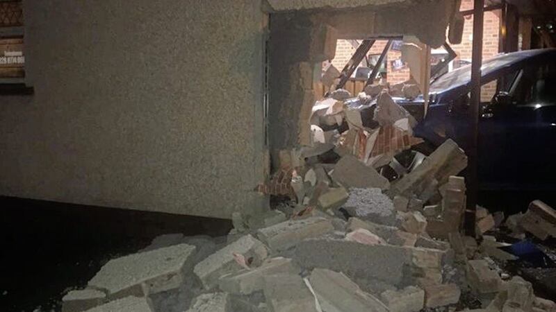 No-one was injured after a car crashed into a pizza shop in Coalisland, Co Tyrone 