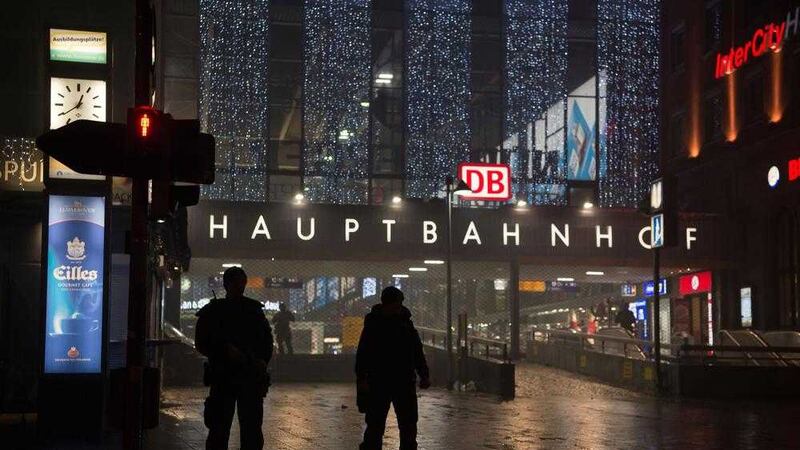 FEARS: German special police stand in front of the Munich, southern Germany, main train station on Thursday after police warned of &#39;imminent threat&#39; of terror attack and ordered two train stations to be cleared. PICTURE: Sven Hoppe/dpa via AP 