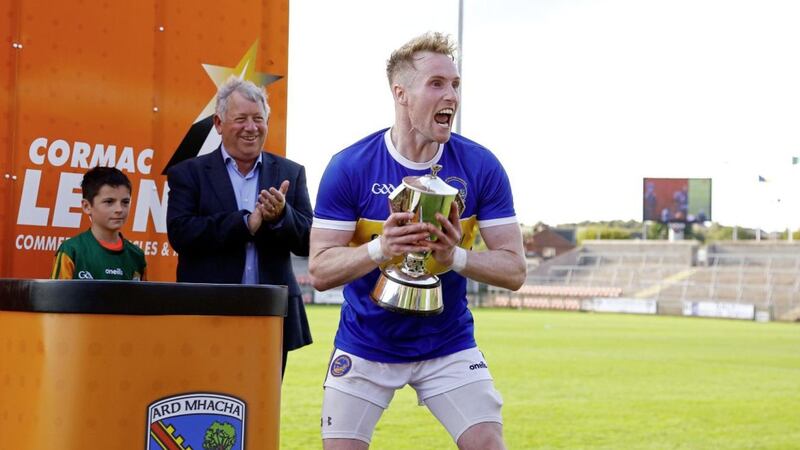 Maghery captain David Lavery celebrates with the Gerry Fegan Cup after yesterday&#39;s Armagh final victory over Crossmaglen. Picture by Seamus Loughran 