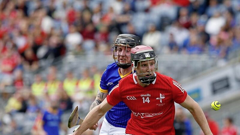 Longford&#39;s Enda Naughton and Louth&#39;s Paul Matthews in action during the Lory Meagher Cup final. Pic Philip Walsh. 