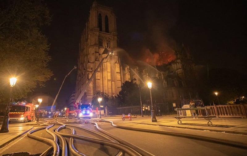 French firefighters at the scene of last night's fire at Notre Dame cathedral in Paris&nbsp;
