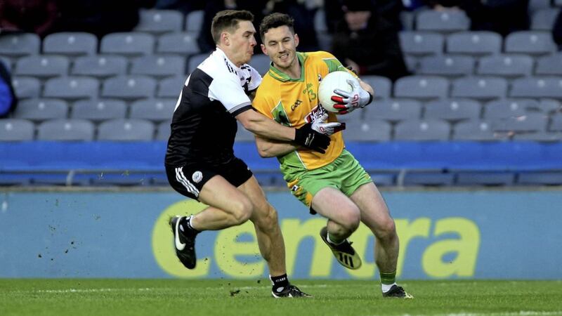 Corofin&#39;s Ian Burke in action with Kilcoo&#39;s Aaron Branagan in yesterday&#39;s AIB All Ireland Club Football final at Croke Park. Picture by Seamus Loughran 