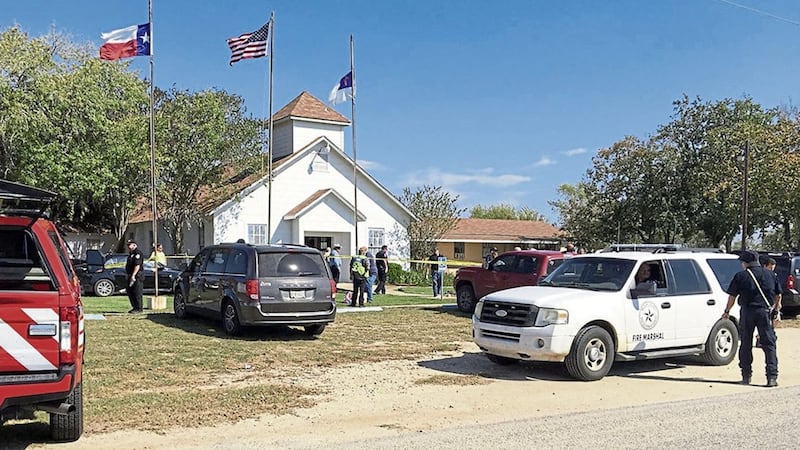 Emergency personnel respond to a fatal shooting at a Baptist church in Sutherland Springs, Texas, Sunday PICTURE: KSAT via AP 