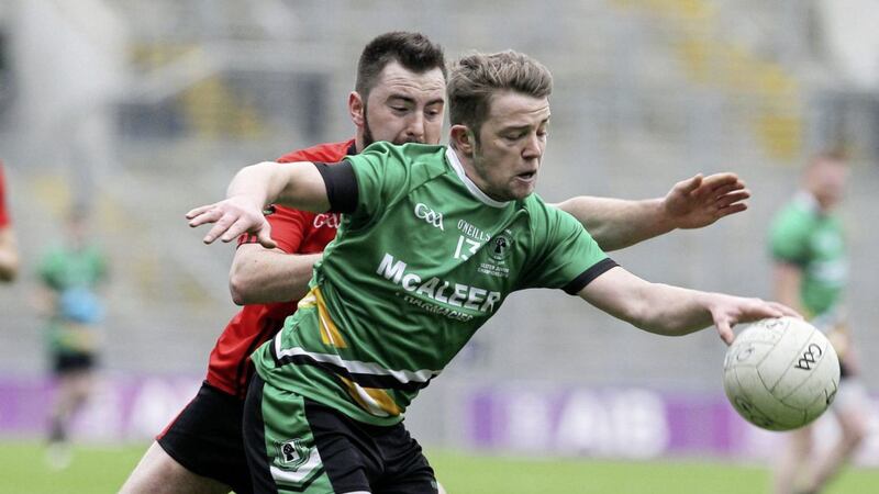 Ryan Crilly of St Patrick&#39;s in action against Jason McKenna of Glenbeigh-Glencar Picture by Philip Walsh 