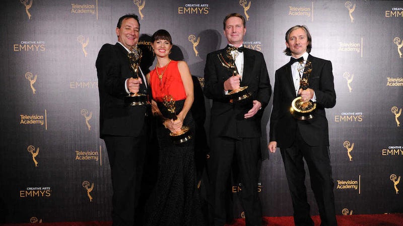A team from Game of Thrones, including Ronan Hill (far right) posing with their Emmy awards in Los Angeles. Picture by Richard Shotwell, Invision/Associated Press