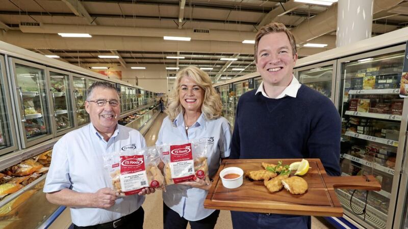 Stephen McNeice (TS Foods Northern Ireland account manager) and Una Finnegan-Roberts (PA to the TS Foods directors) with Jonathan McWhinney (packaged food buyer at Tesco NI) 